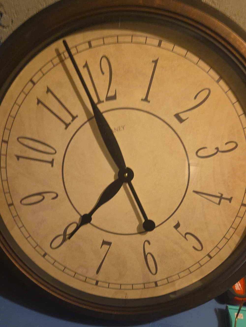 Classic Round Wall Clock in Brown and Black